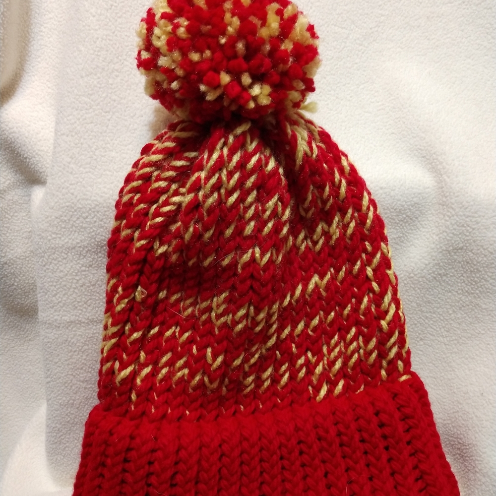 Beautiful hand knitted red and yellow beanie